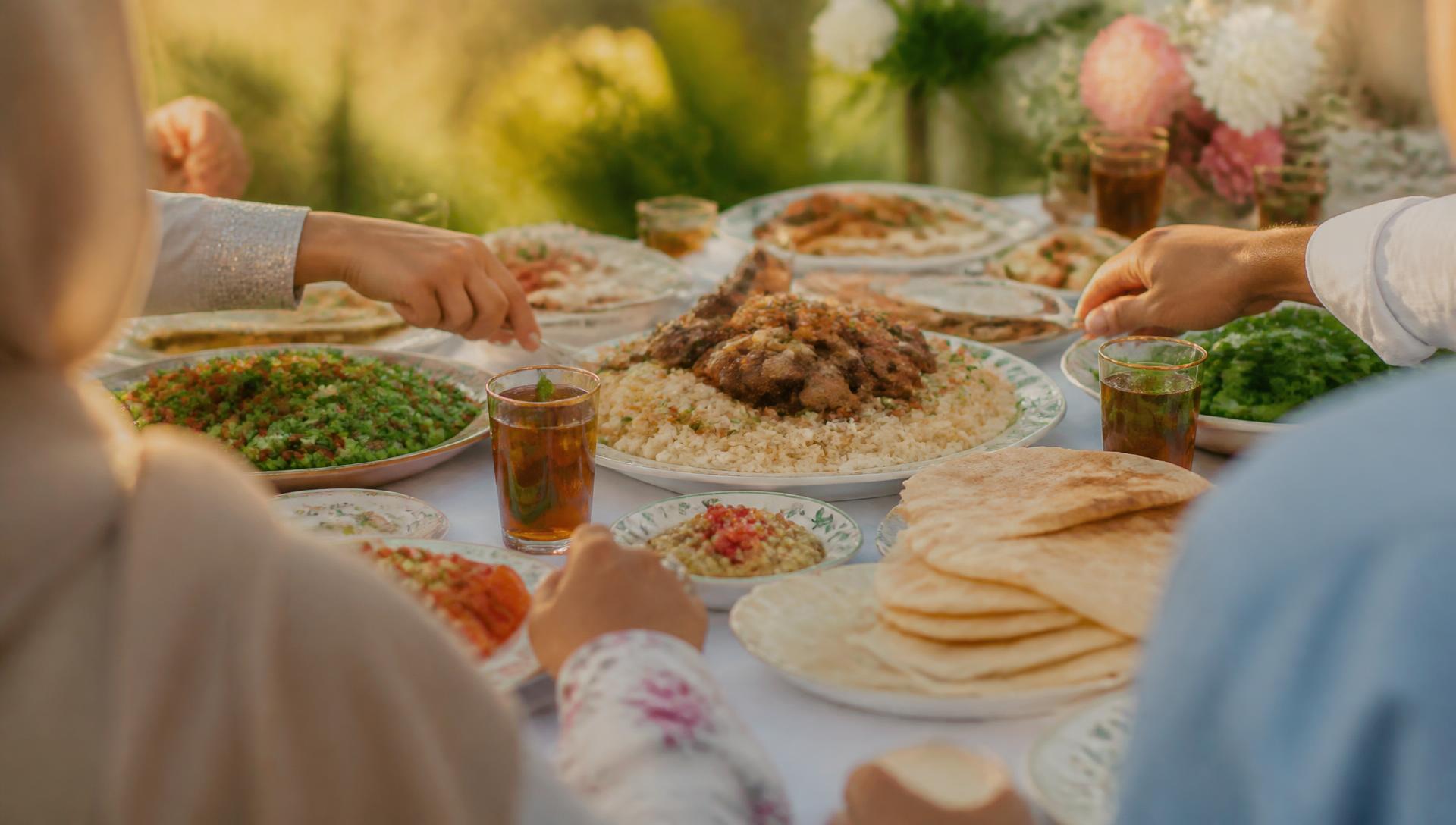 A generous table set for a walimah gathering
